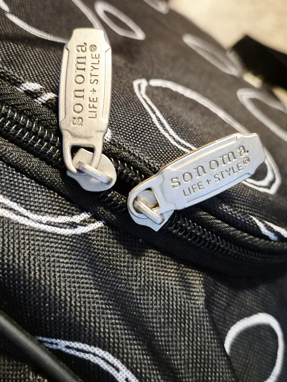 Sonoma Black/White Infinity Circle Rolling Woven Nylon Duffle Travel Bag